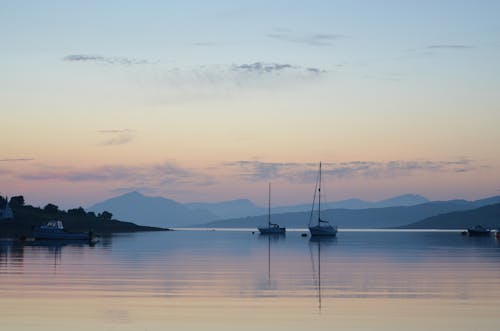 Sail Boat on Calm Body of Water