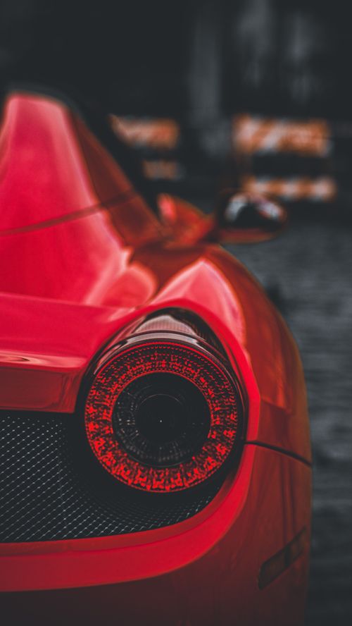 Free Stylish and modern close-up of a red sports car's taillight in São Paulo, Brazil. Stock Photo
