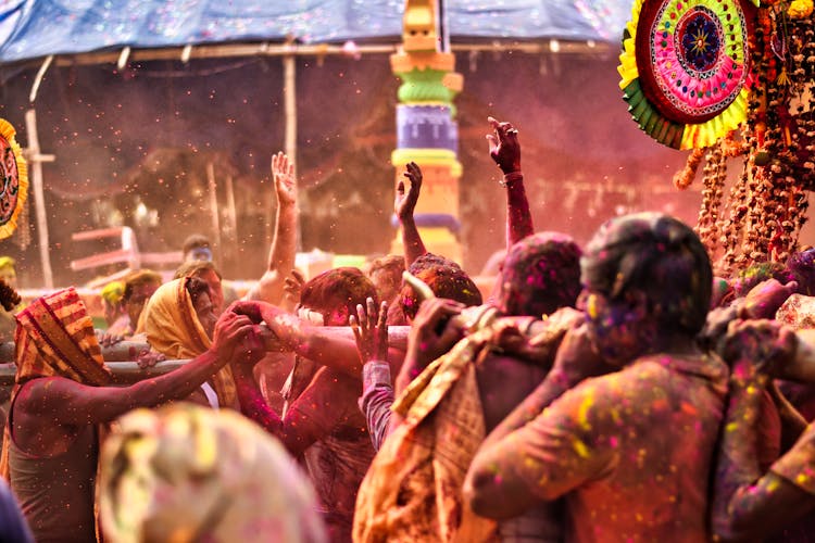 People Celebrating The Festival Of Colors 