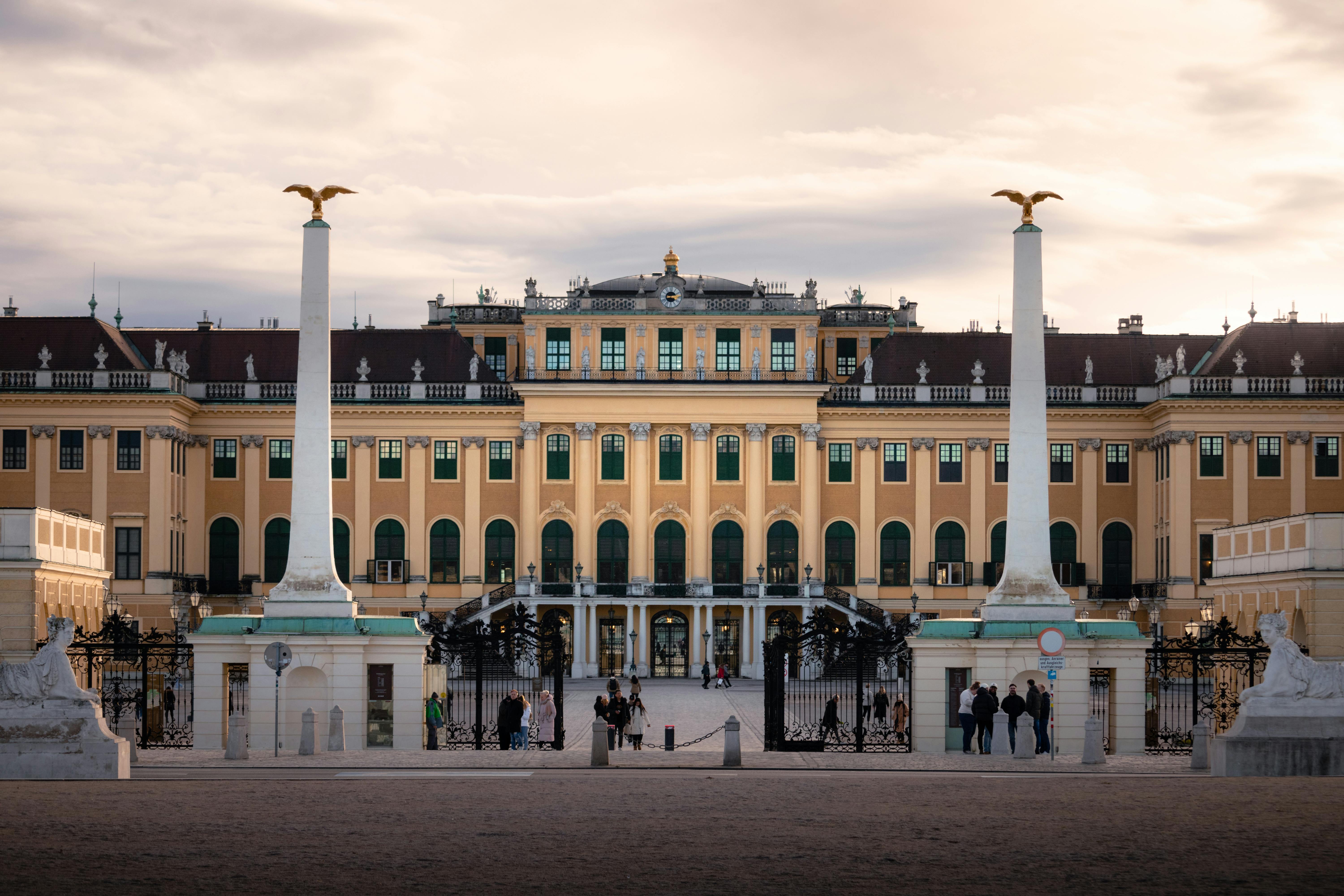 a large building with columns and statues