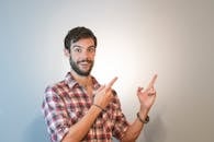 Smiling Man Pointing Fingers