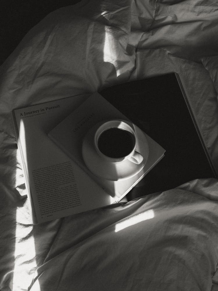 Cup Of Coffee On A Book 