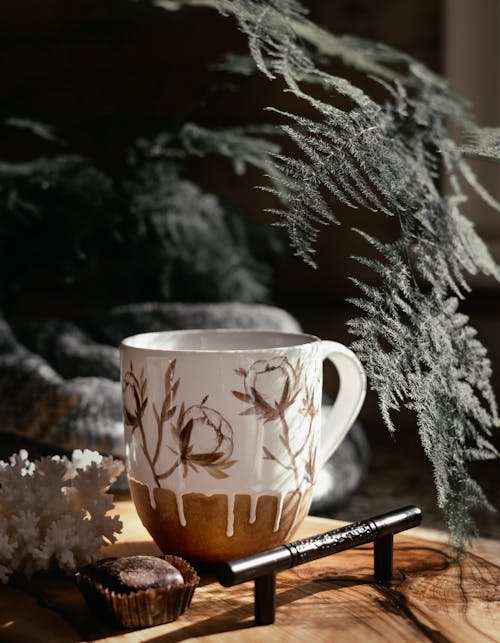 Decorated Cup with Evergreen Leaves