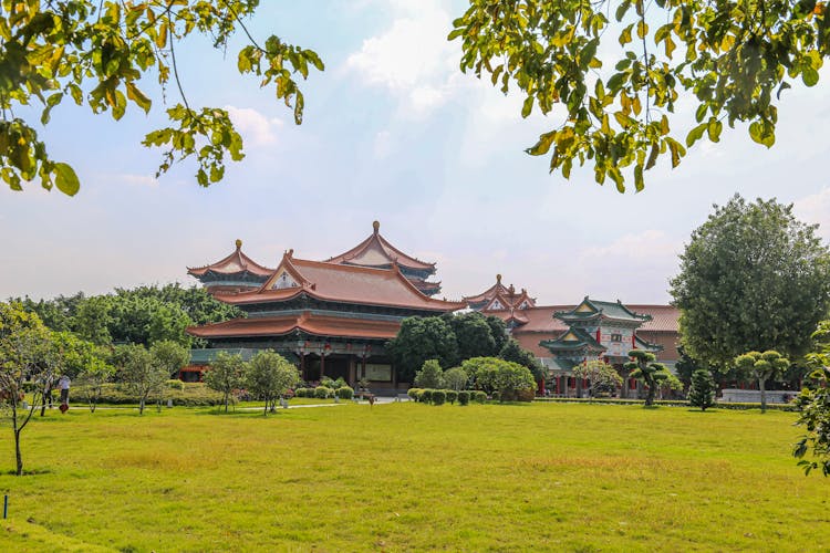 Lawn And Temple Buildings Behind