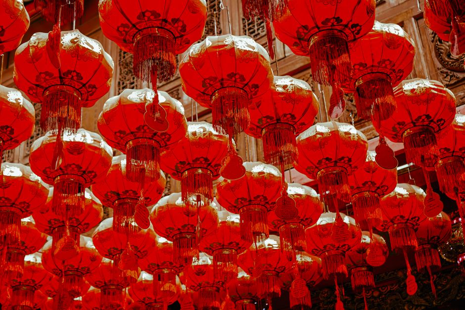 A captivating view of red Chinese lanterns hanging indoors, showcasing traditional art and decoration.