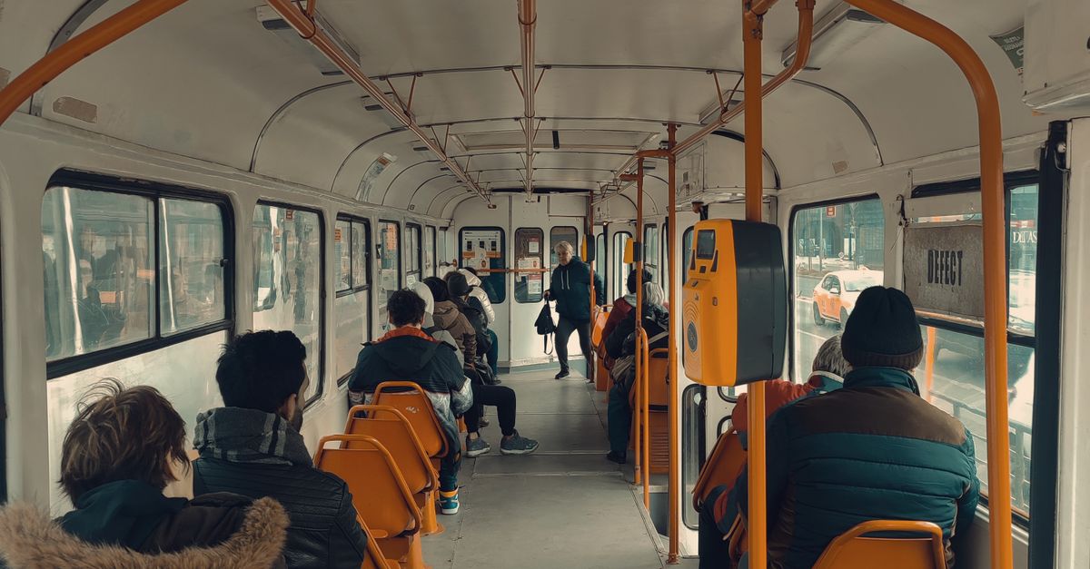 People Using Transport People on Public Transportation Vehicle · Free Stock Photo
