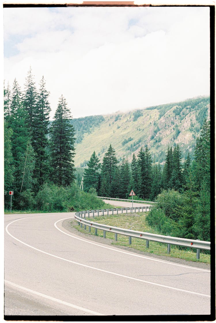 Film Photograph Of A Road In Mountains 