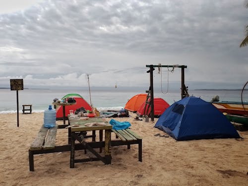 durgun deniz, gevşeme, güzel doğa içeren Ücretsiz stok fotoğraf