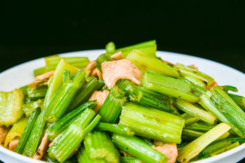 Free Close-up of a delicious and healthy stir-fried celery and chicken dish, perfect for a nutritious meal. Stock Photo