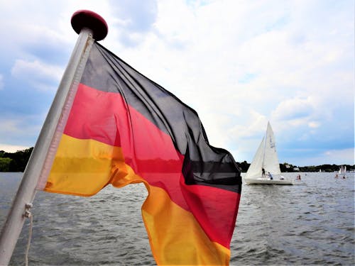 Flag of Germany, lake, sailing boat