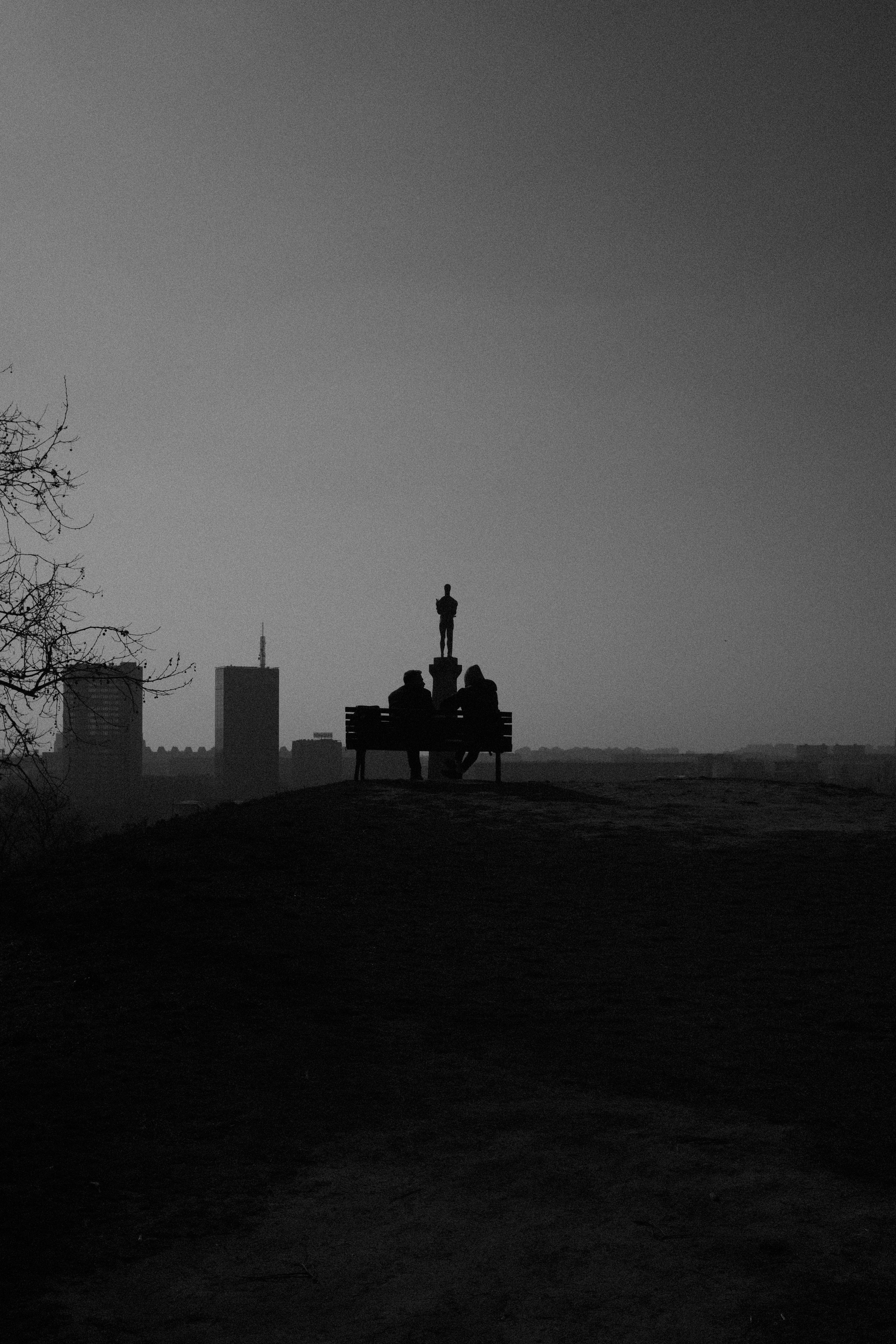 Silhouette of Statue on Top of Building · Free Stock Photo
