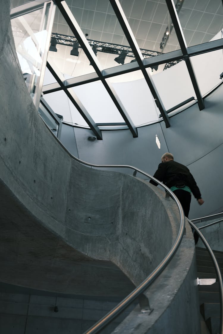 Man Walking Up The Stairs