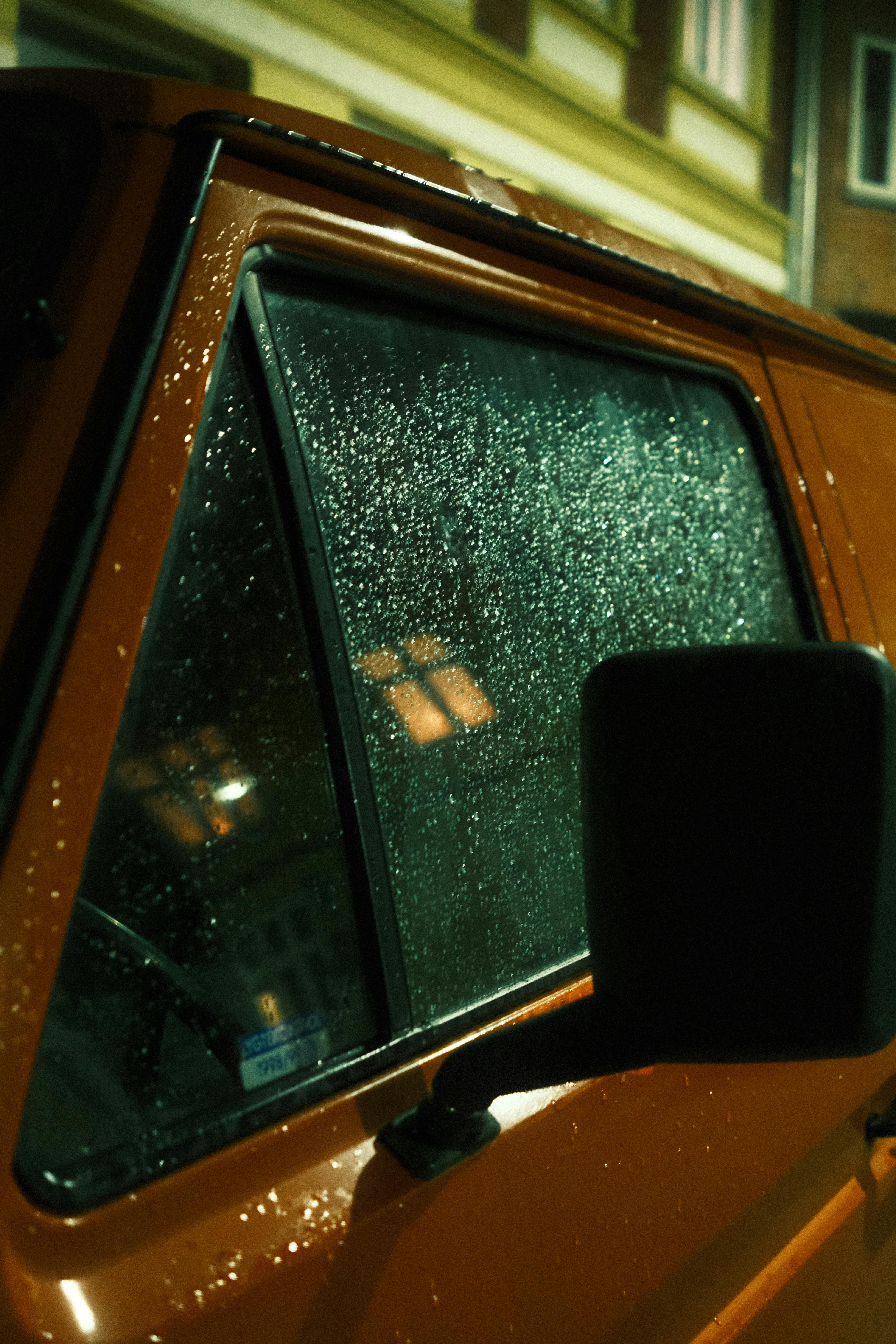 drops of the rain on a car