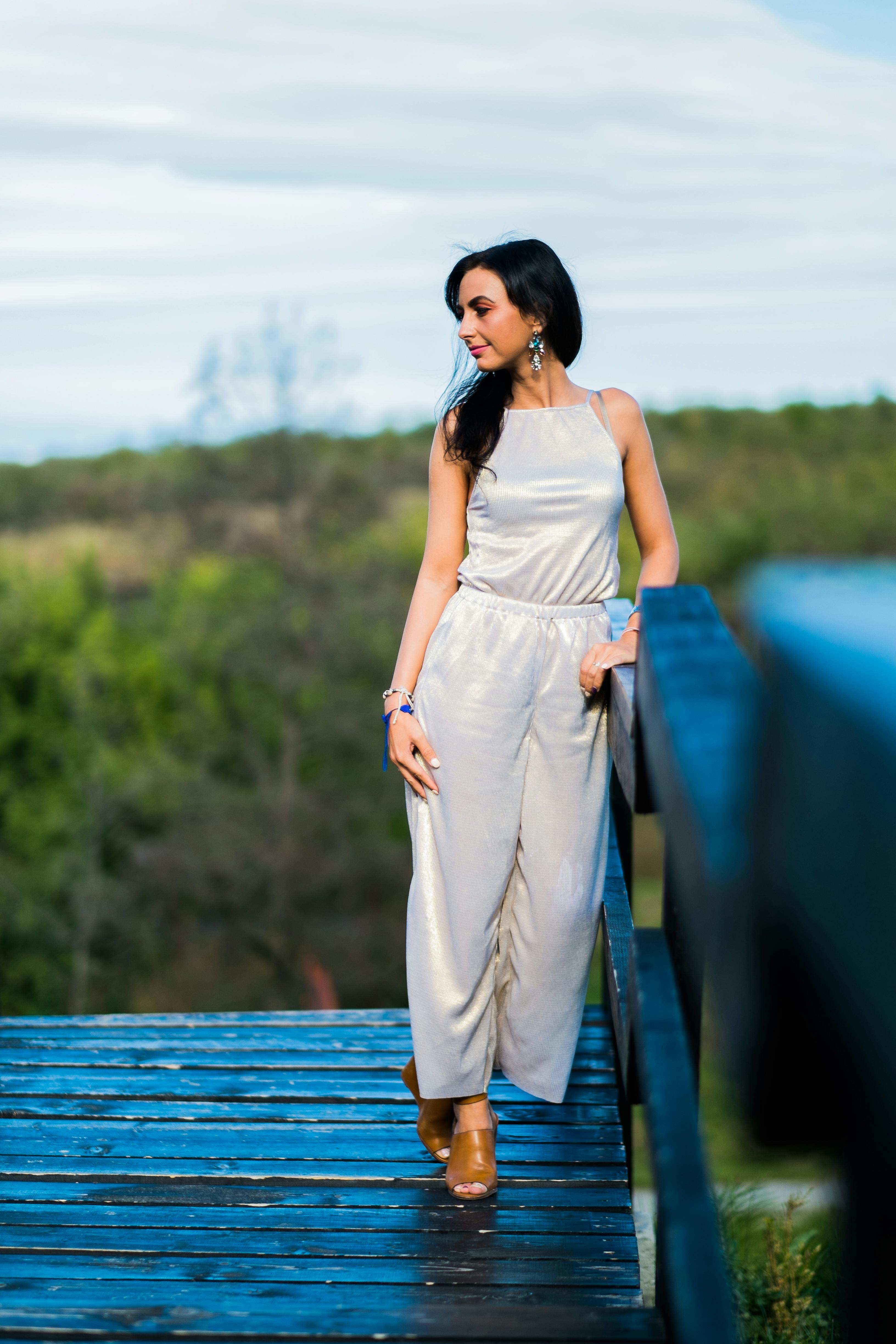 Girl in Denim Overalls Posing Against the Sea Stock Photo - Image of  beauty, casual: 282216560