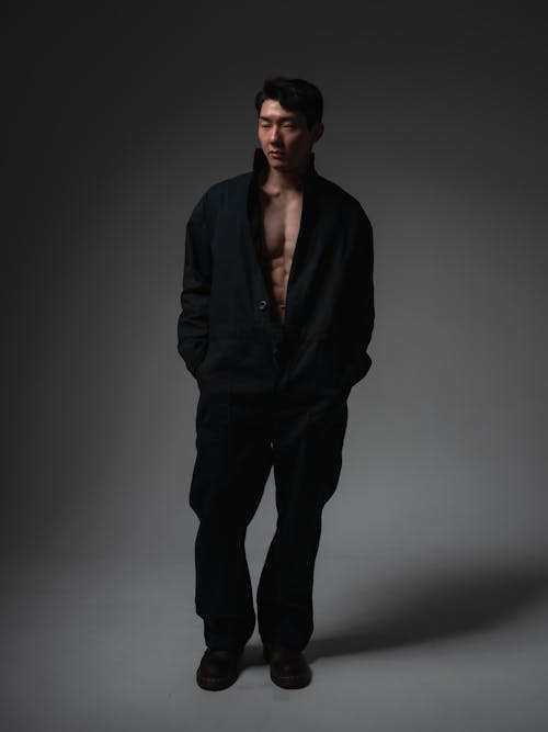 Shirtless Man in Coat