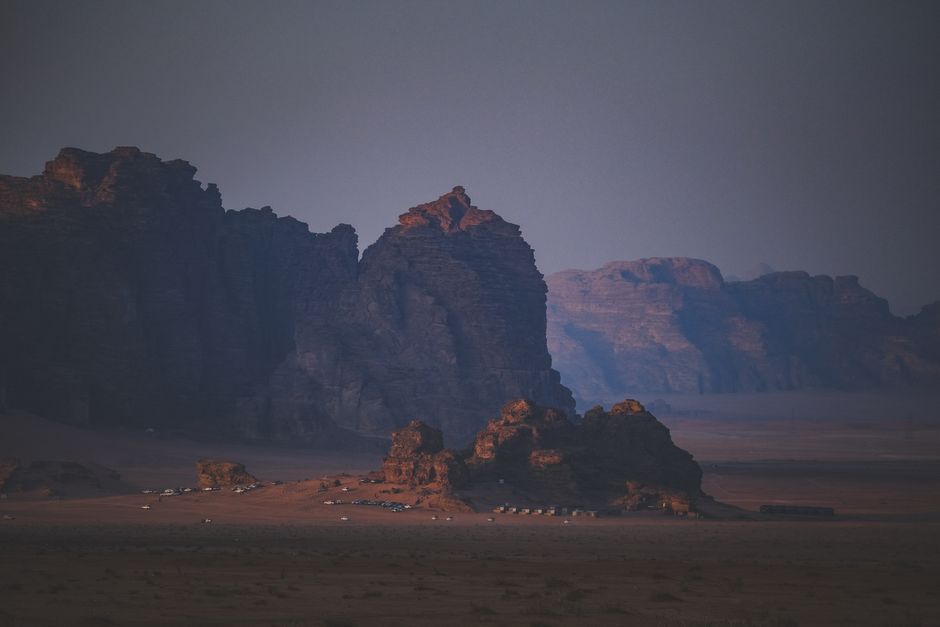 A Bedouin man serving traditional tea in a tent in Wadi Rum, Jordan