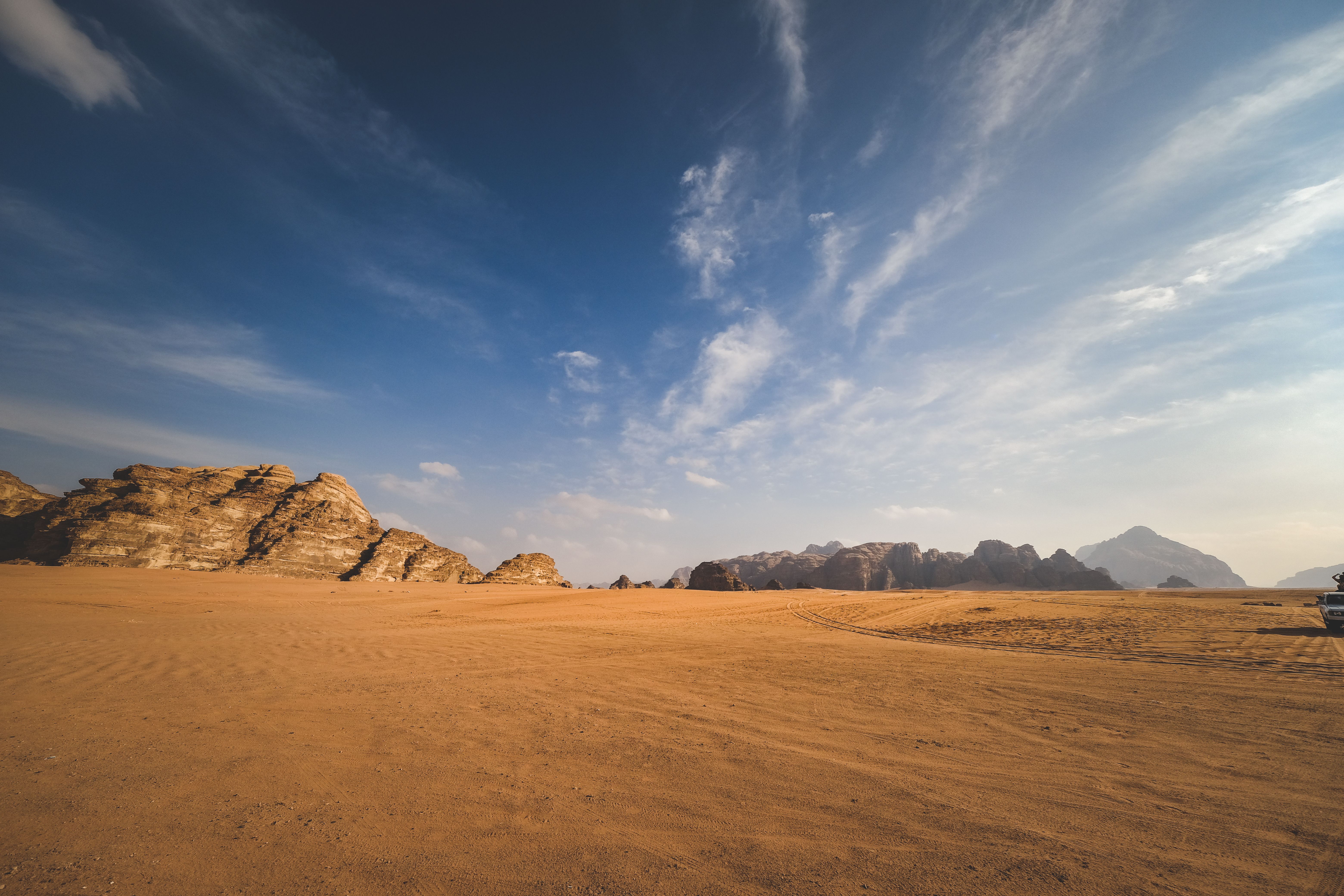 Expansive Wadi Rum panorama of sandstone formations crossed on the Seven Pillars expedition