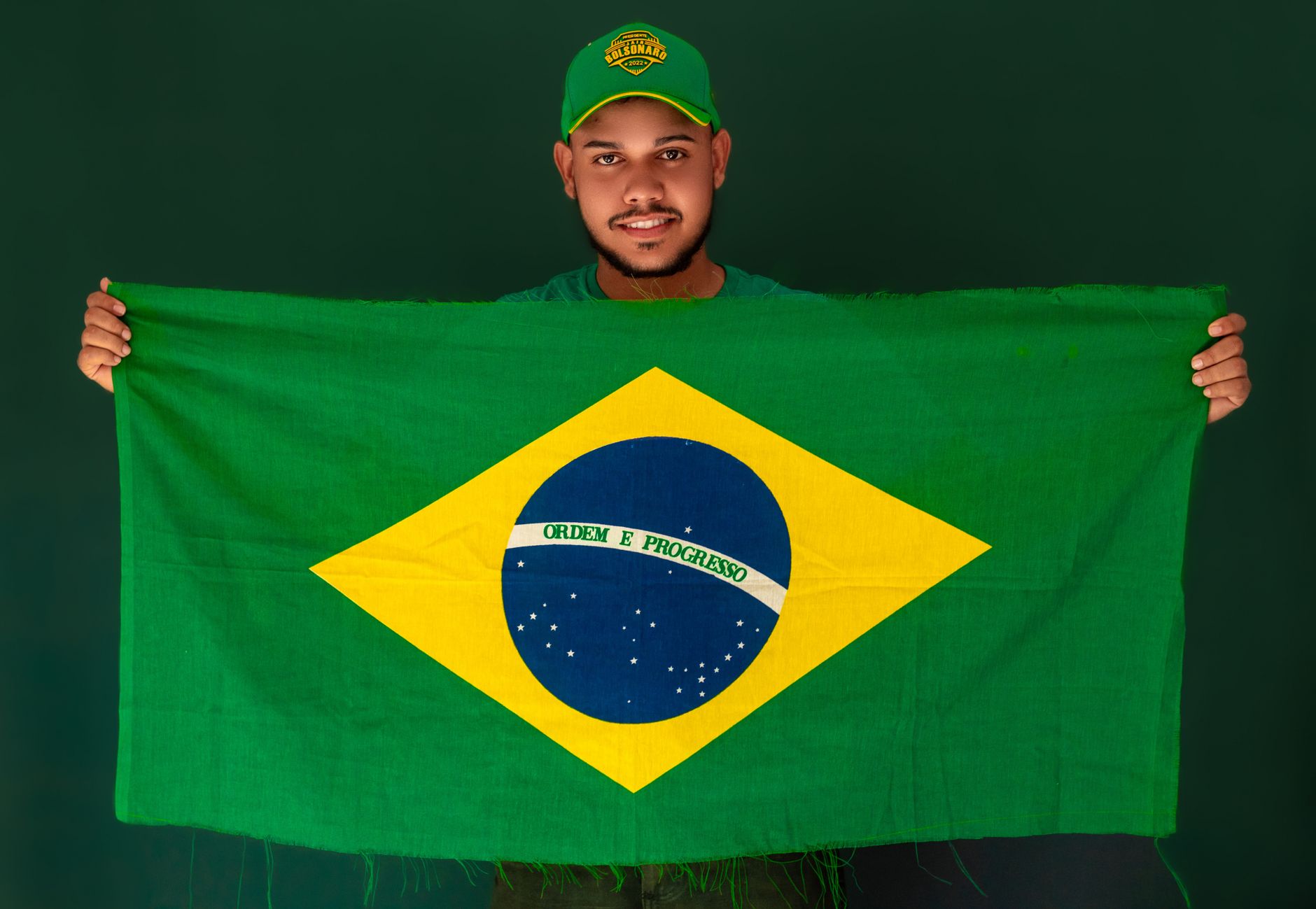 Fans from different countries gathering at a lively World Cup fan festival beside food stalls and large screens