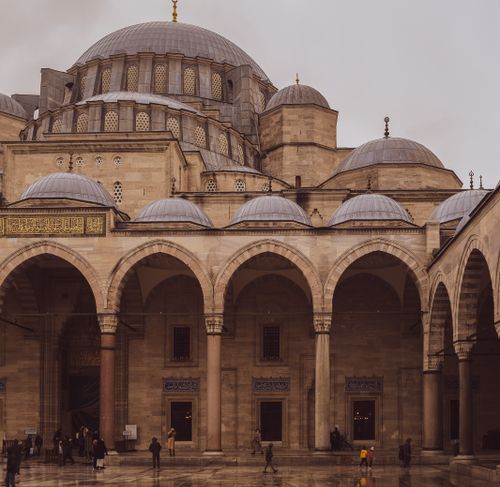 Free Majestic view of Süleymaniye Mosque's courtyard in İstanbul, showcasing Ottoman architecture. Stock Photo