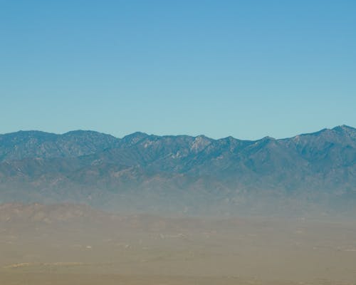 Mountain Range under a Clear Sky 