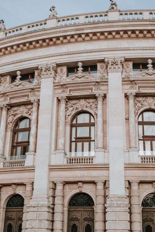 Clock Windows Building A building with windows and a clock on it · Free Stock Photo