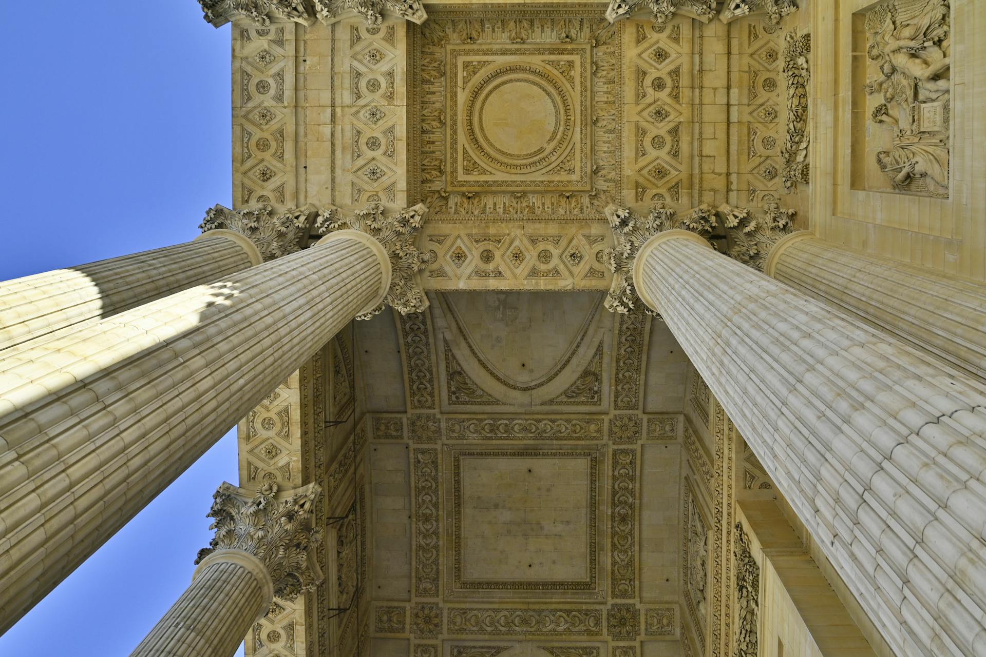 Paris France Pantheon Neoclassical entrance temple ceiling detail motifs supported by Corinthian columns