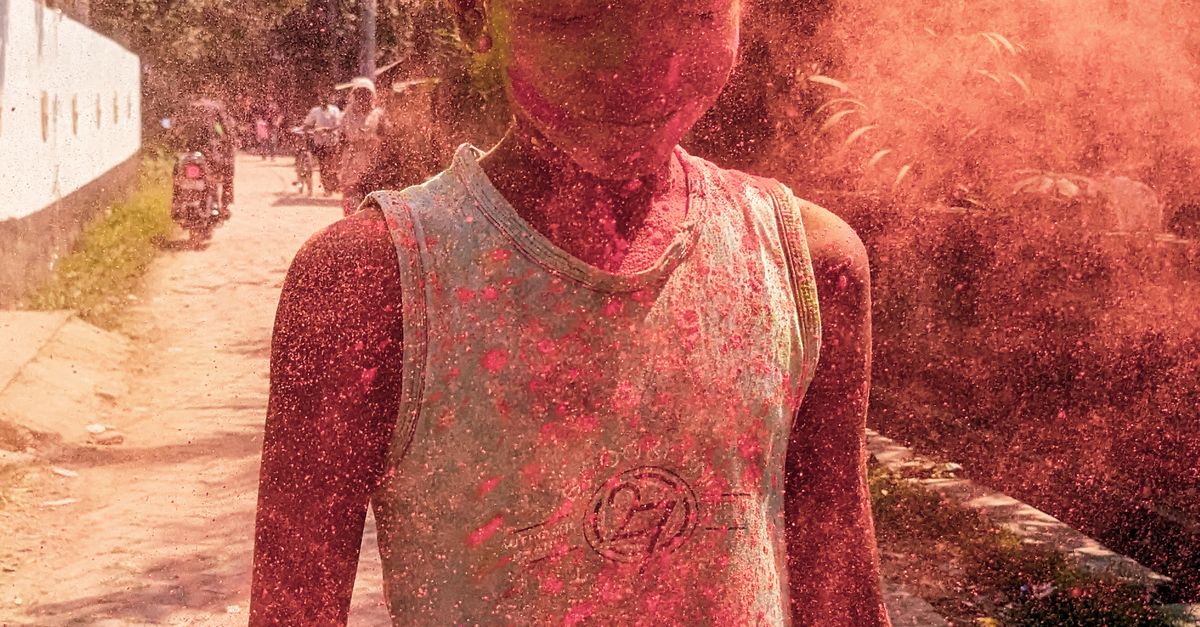 Hit Powder Boy Hit by a Cloud of Red Powder · Free Stock Photo