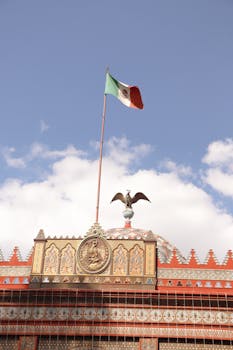 The Kiosco Morisco in Mexico City with a Mexican flag on a sunny day.