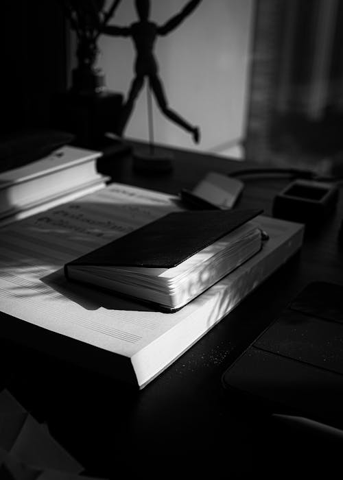 Book Lying on Table in Room