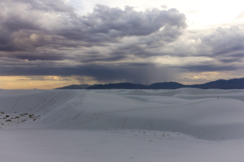 Free Rain over the white desert mountains Stock Photo