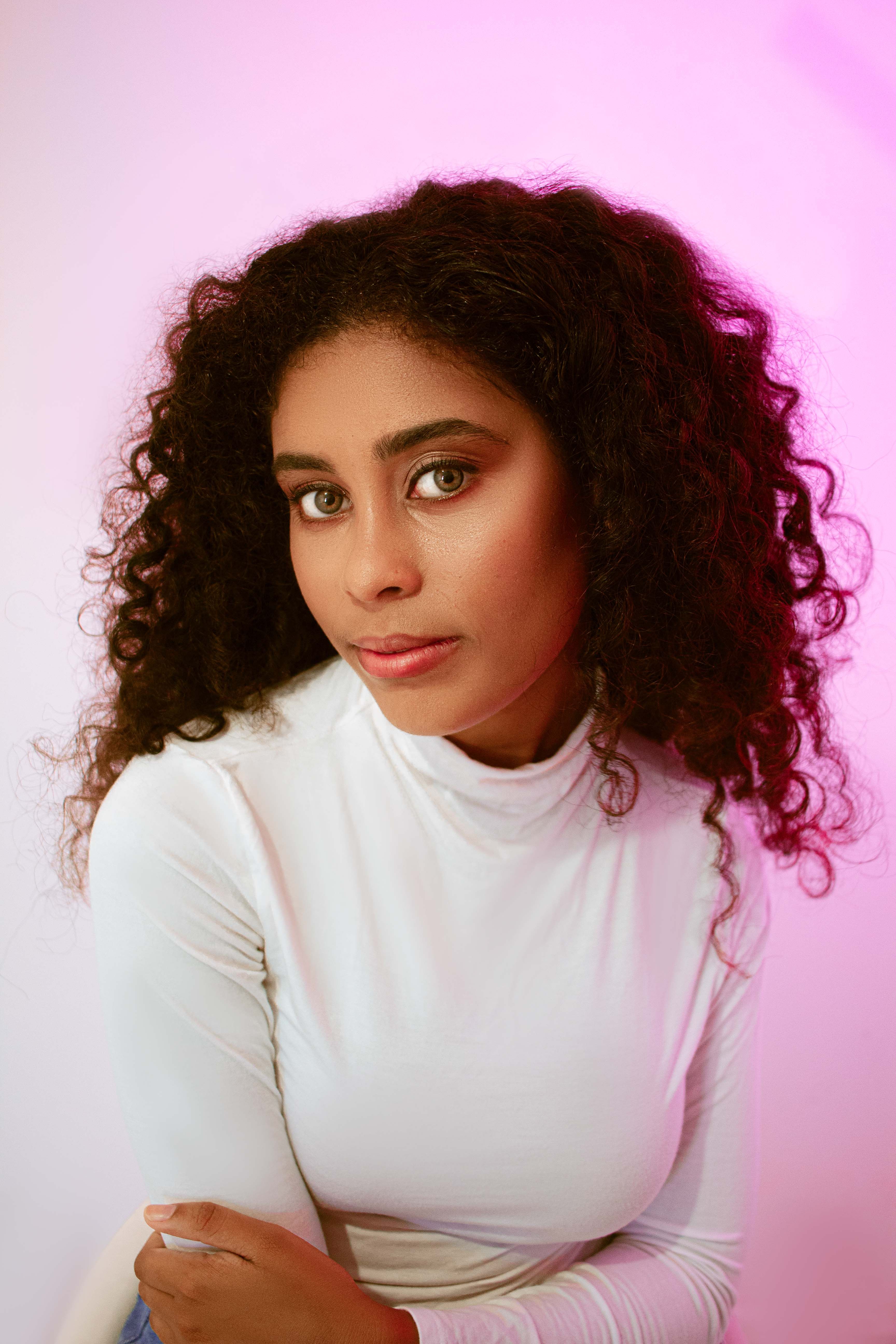 Portrait of Woman with Curly Hair · Free Stock Photo