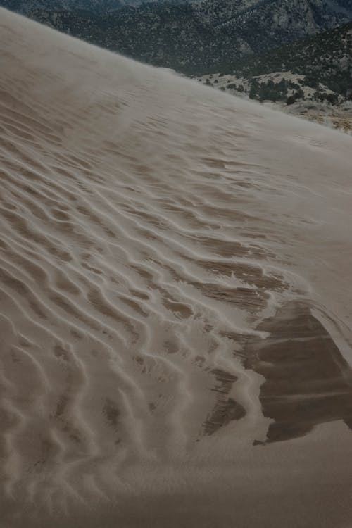 Безкоштовне стокове фото на тему «вертикальні постріл, пагорб, пісок»