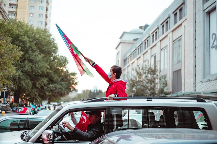 Man In Mask And With Azerbaijani Flag