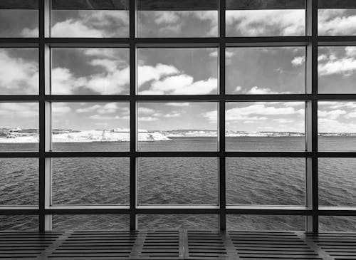 Ferries Seen From a Window in Black and White 