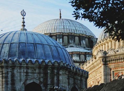 Captivating view of Sehzade Mosque domes in Istanbul, showcasing Ottoman architecture.