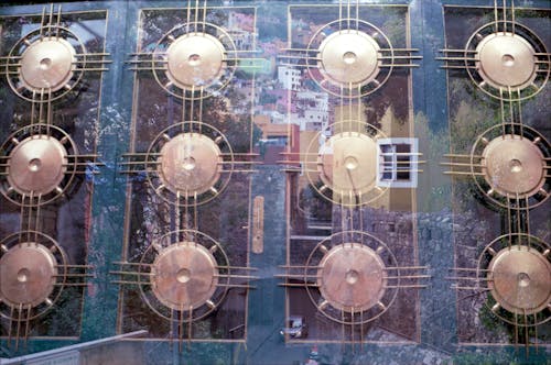 Double Exposure Photo of Buildings in City and a Building Exterior 