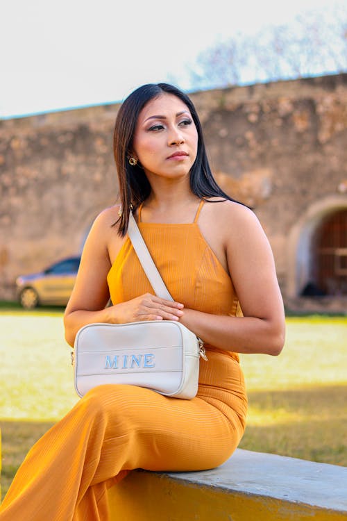 Woman Posing in Yellow Dress