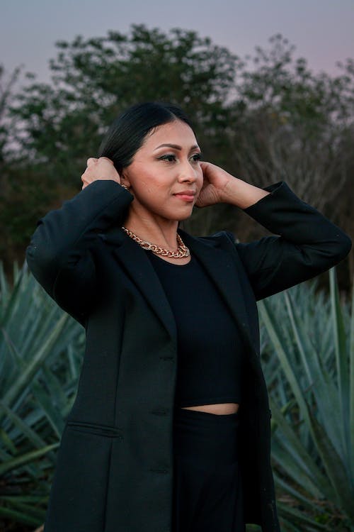 Woman Posing in Black Clothes