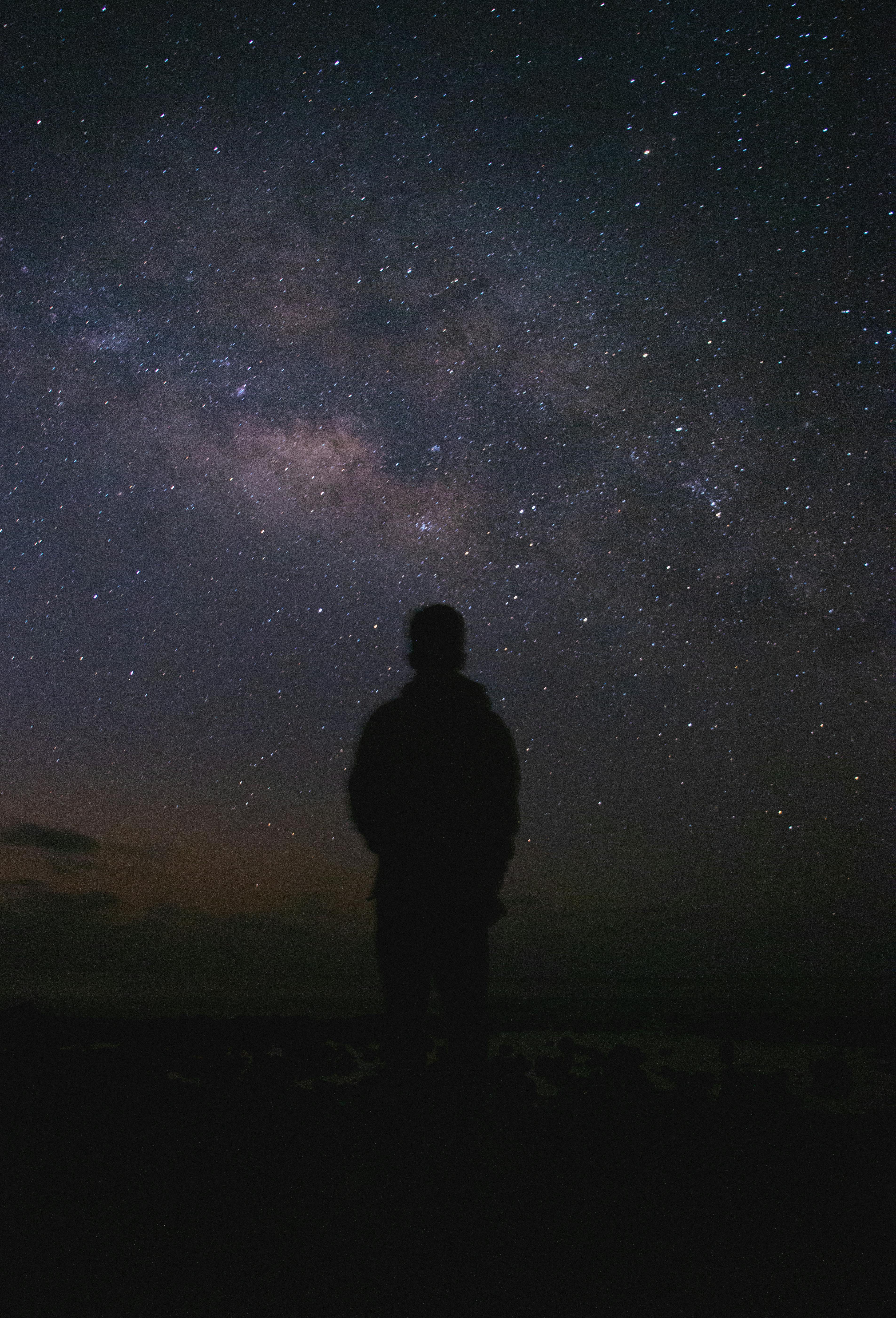 person looking at night sky