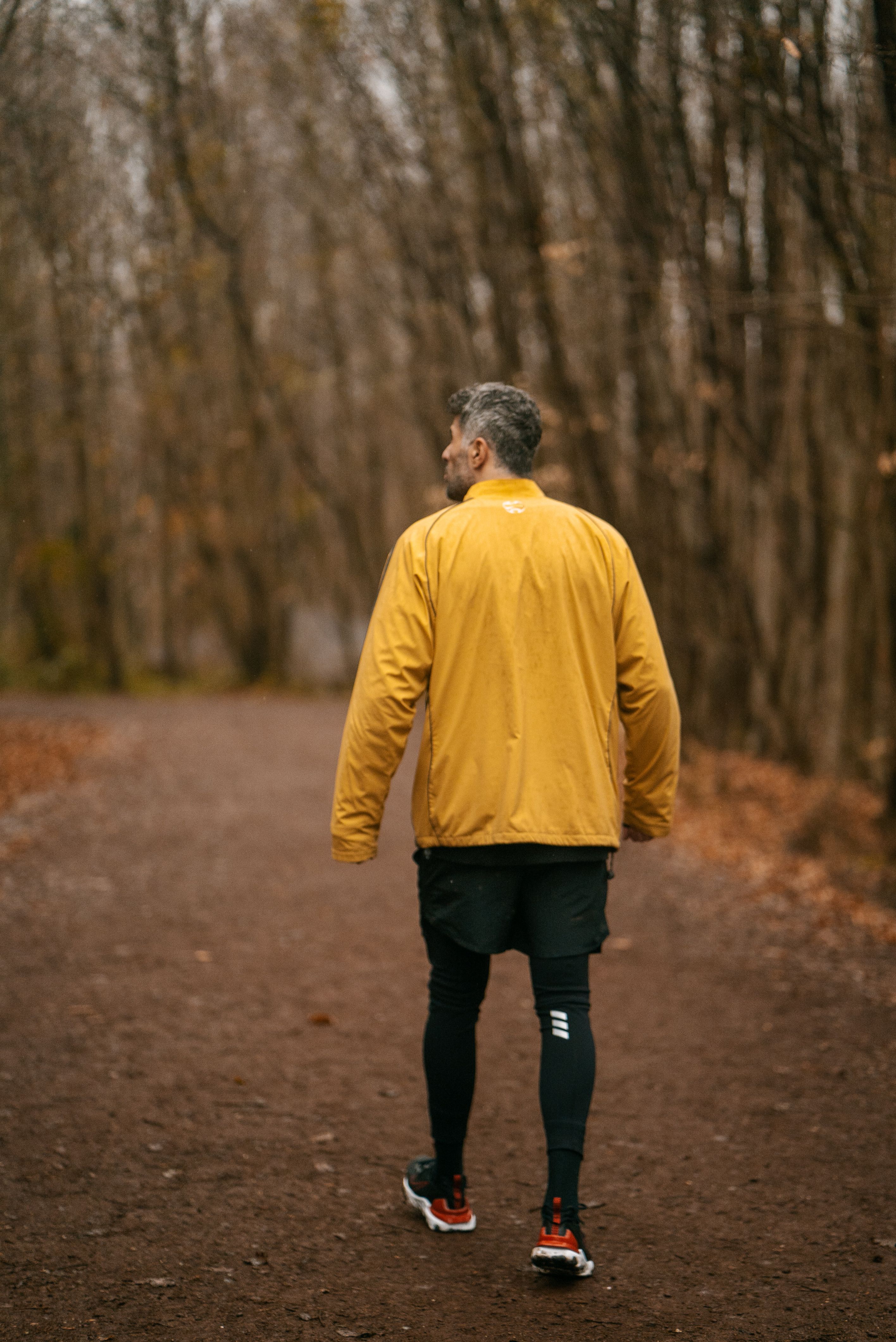 Man Walking among Trees · Free Stock Photo