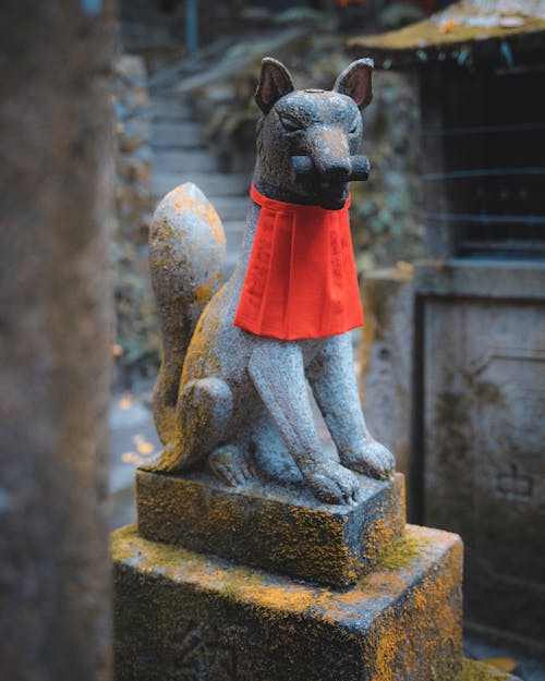 A Statue of a Fox in Fushimi Inari Shrine, Kyoto, Japan 
