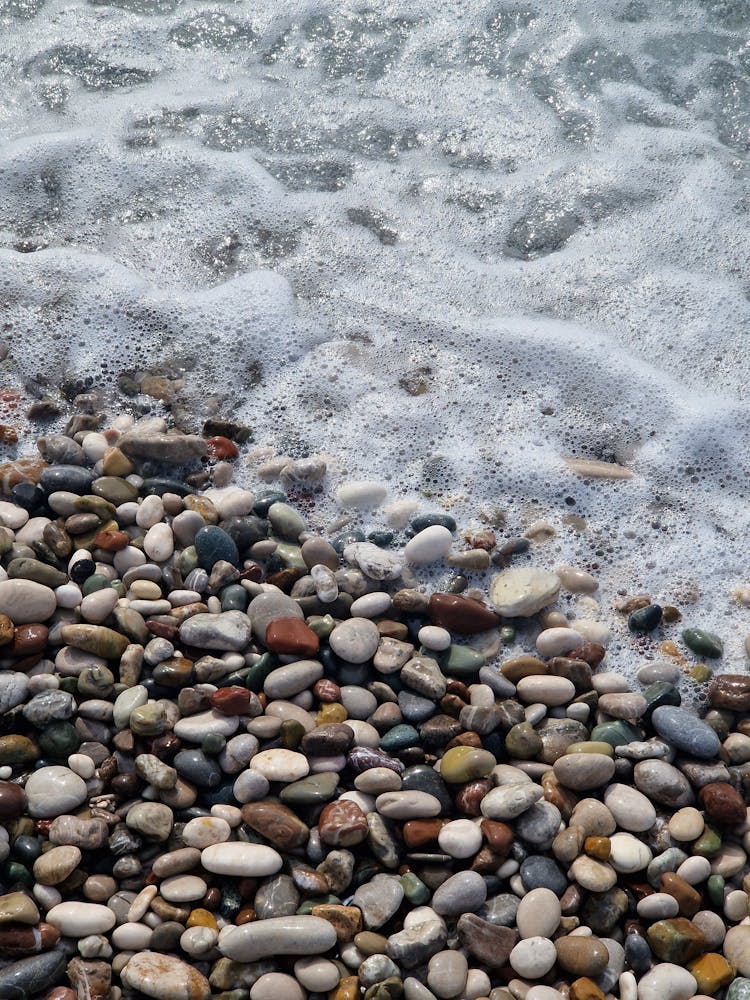 Close Up Of Pebbles And Foam