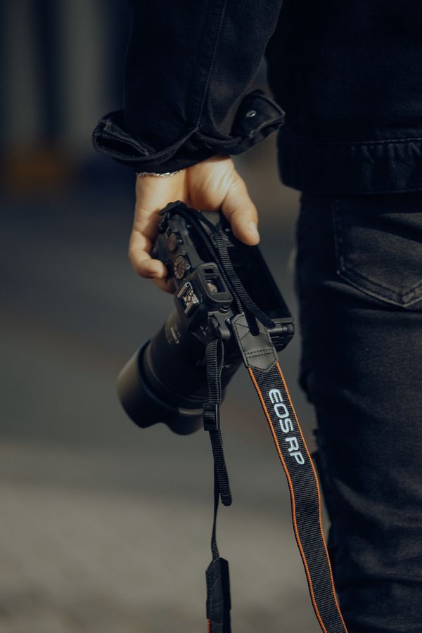 Photographer holding camera