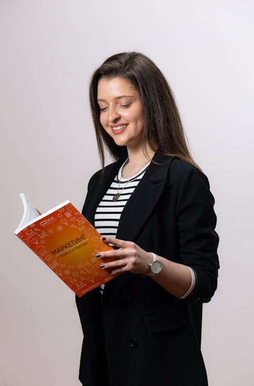 Portrait of Woman Holding Book