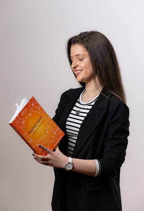 Portrait of Woman Holding Book