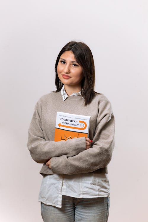 Portrait of Woman Holding Book