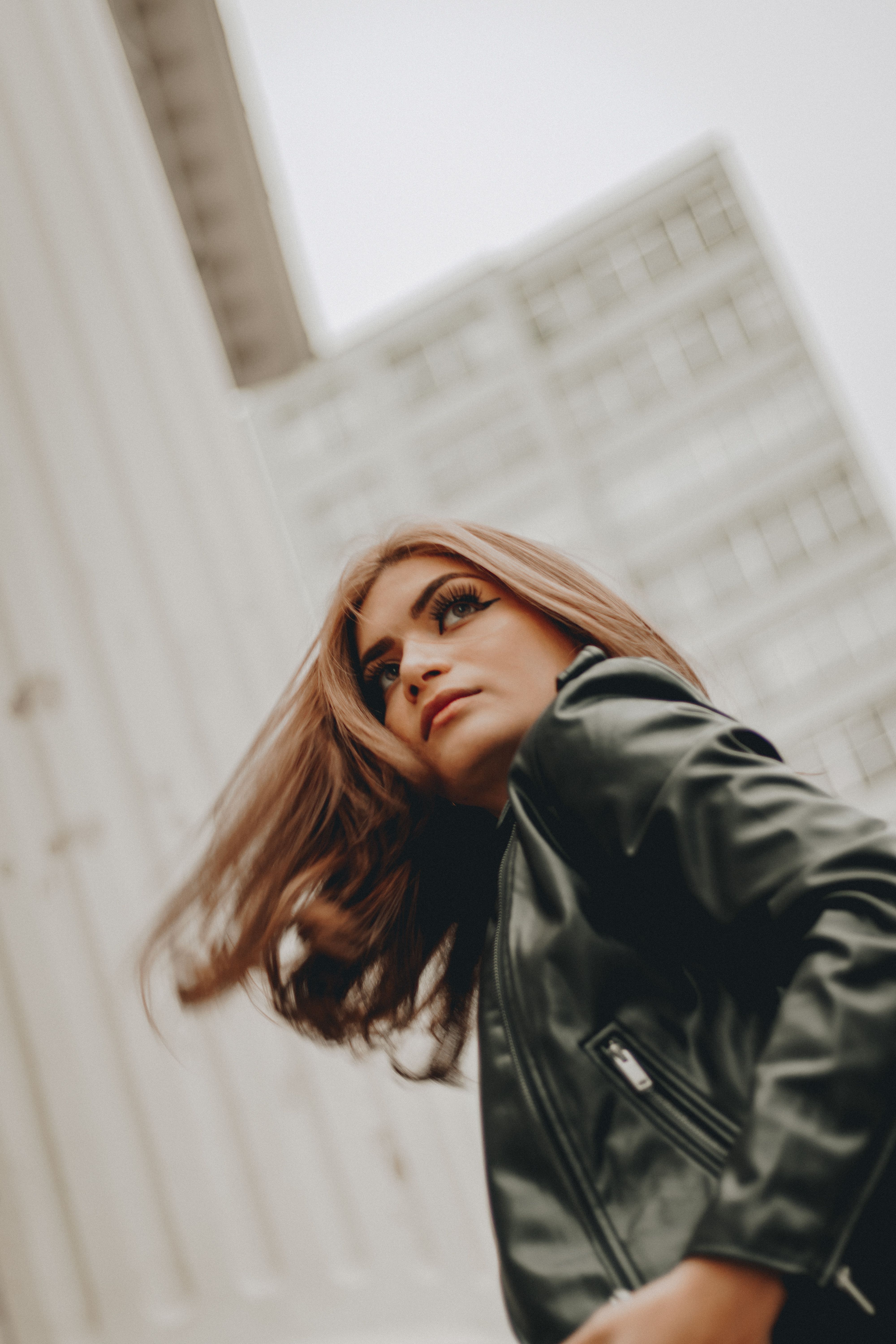 Woman in leather jacket in the city