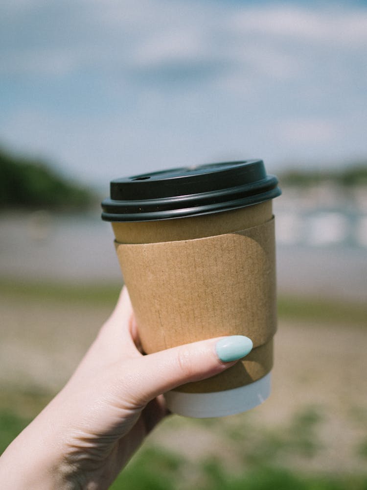 Woman Hand Holding Cup