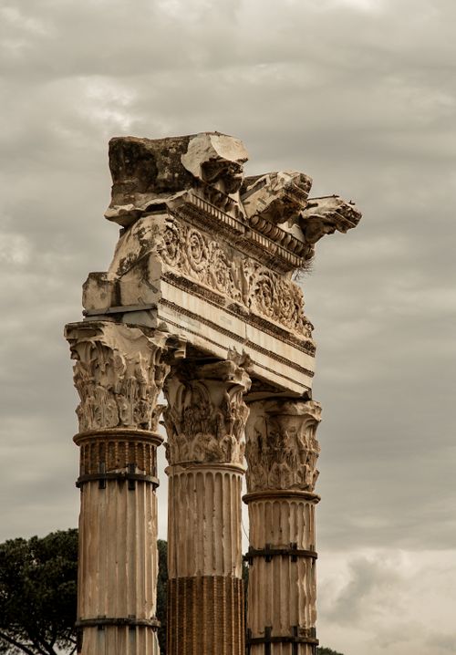 Free Historic ruins of Temple of Venus Genetrix in Rome, captured with dramatic overcast skies. Stock Photo