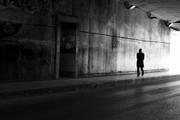 Man In Under Bridge Passage